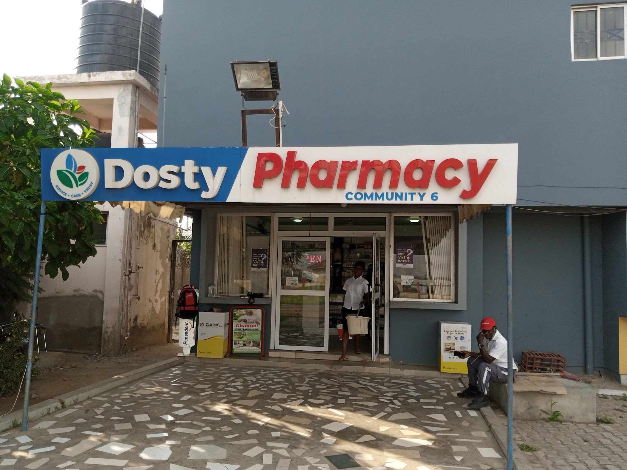 A first look at Dosty Pharmacy | Community 6 | Tema | Ghana 🇬🇭, showing the entrance or frontage patients use when deciding whether to stop in.