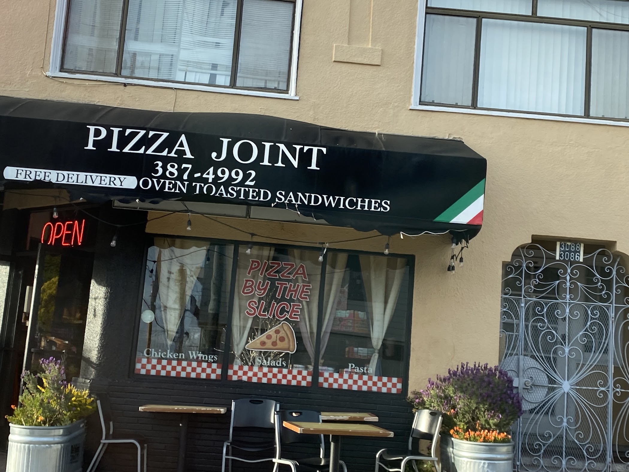 A first look at Pizza Joint, showing the kind of neighborhood pizzeria you are walking into in San Francisco.