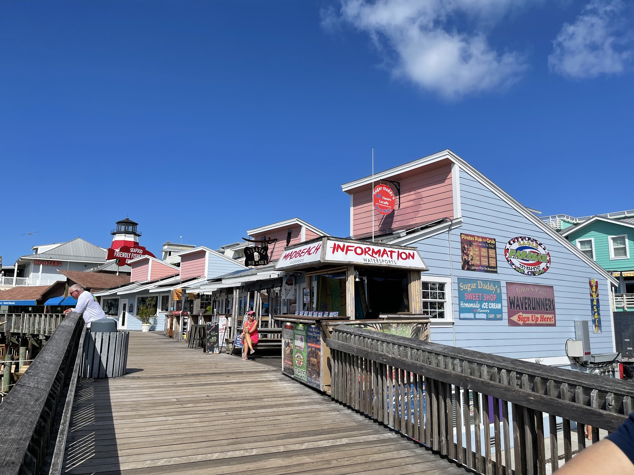 The waterfront setting at John’s Pass Village & Boardwalk, where the boardwalk, shops, and marina-side activity set the pace for the visit.