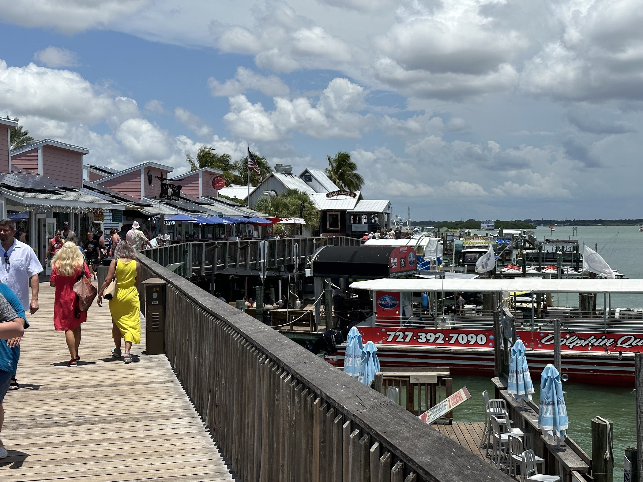 Arrival and context view at John’s Pass Village & Boardwalk in Madeira Beach, Florida.