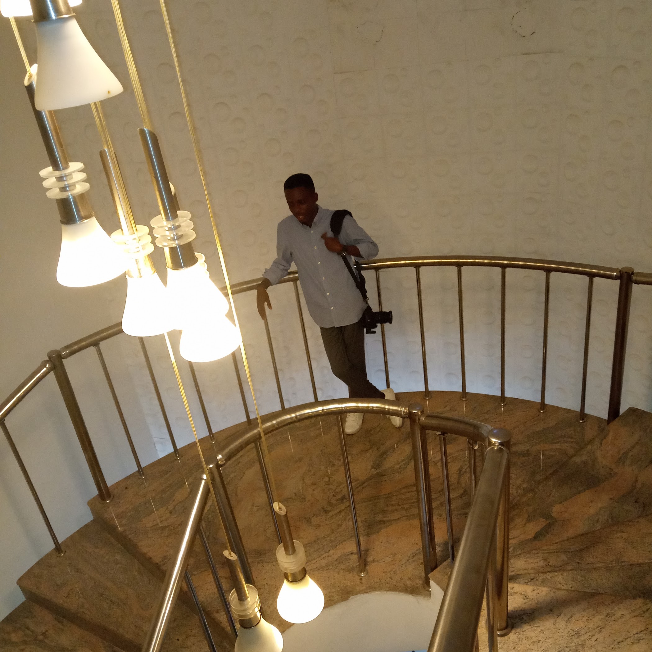 Arrival and exterior context at De Lankaster Hotel & Suites in Lagos, Nigeria.