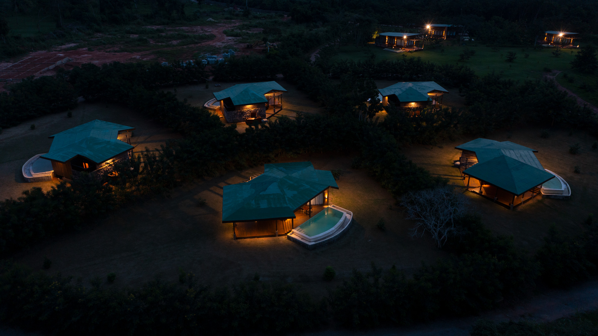 Cabin design and surrounding greenery help define the resort experience.