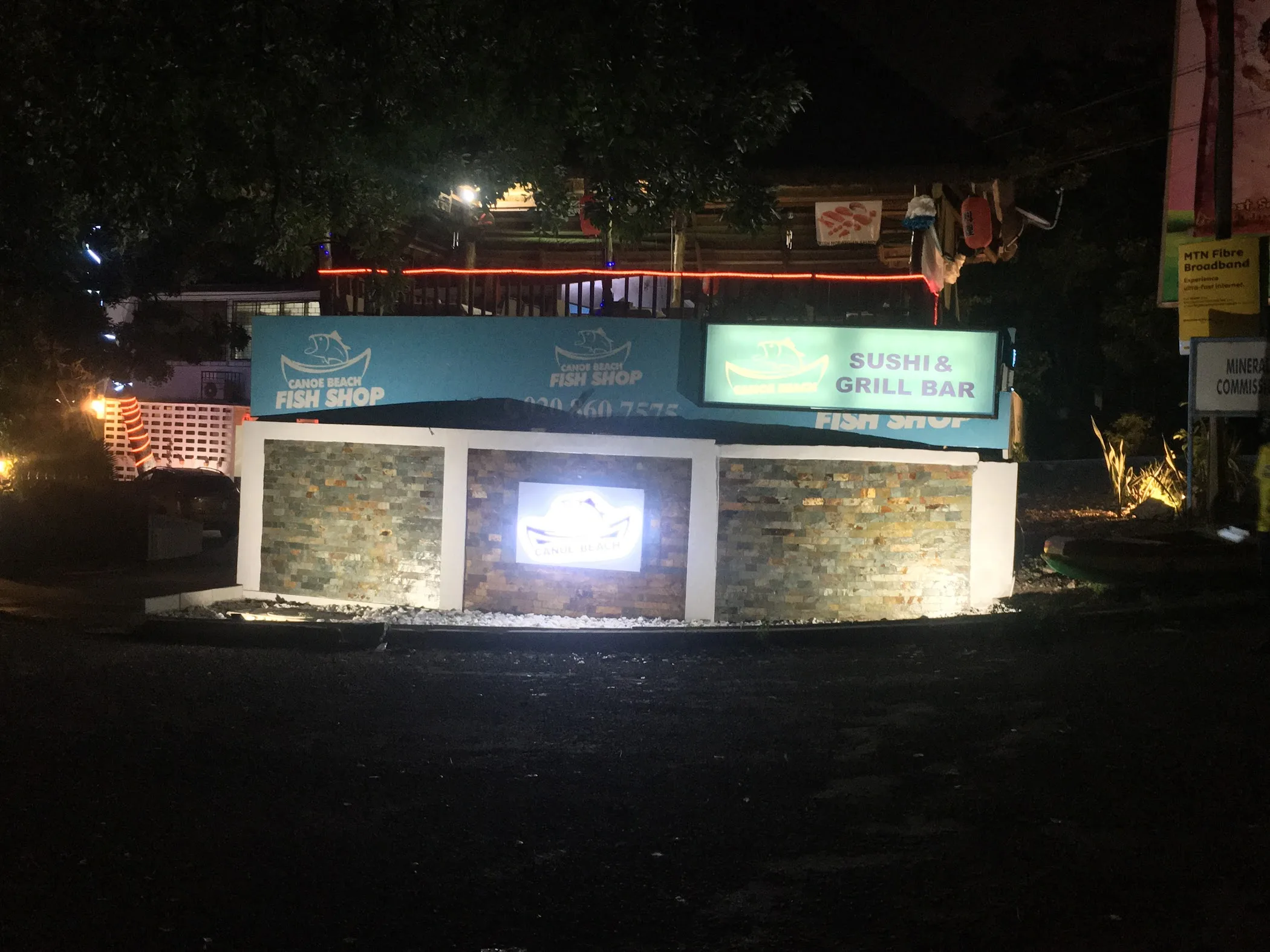 Arrival and context view at Canoe Beach Sushi & Grill Bar in Accra, Greater Accra Region.