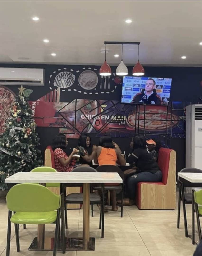 Arrival and context view at Pizzaman Chickenman koforidua in Opposite Linda Dor Restaurant, Koforidua.
