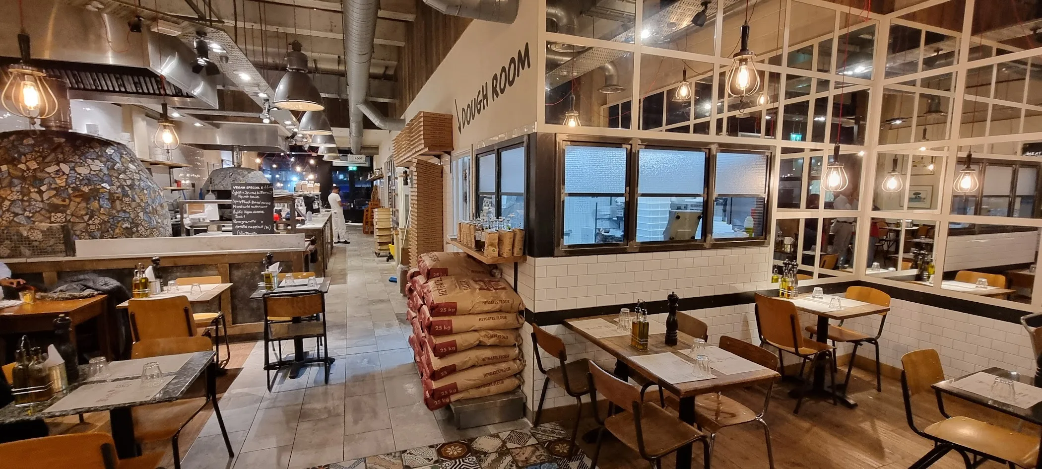 Franco Manca Canary Wharf at Crossrail Place, useful for judging whether the branch suits a quick pizza stop or a sit-down meal.