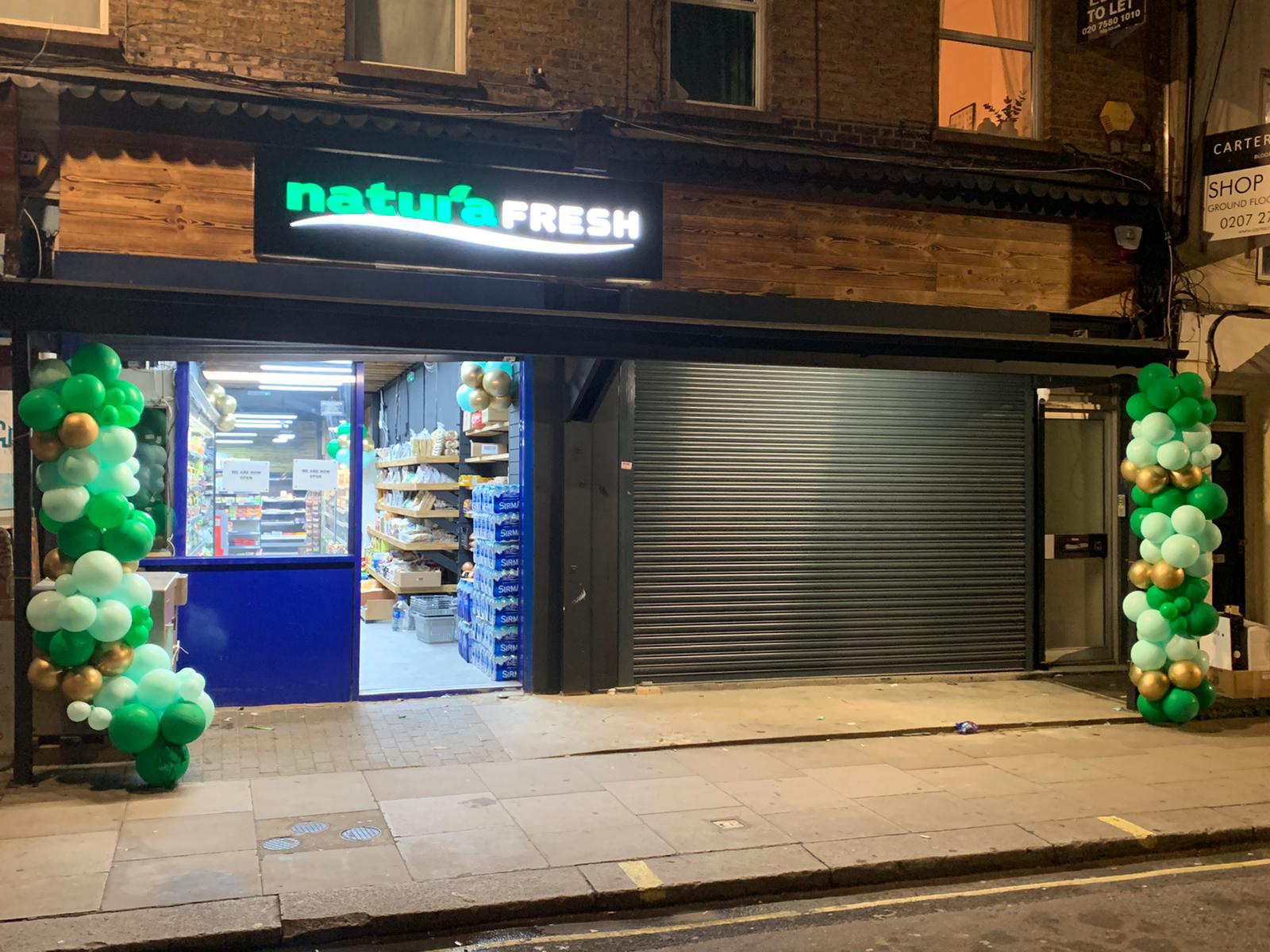 The storefront on Pratt Street, useful for seeing how Natura Fresh sits inside a busy Camden shopping block.