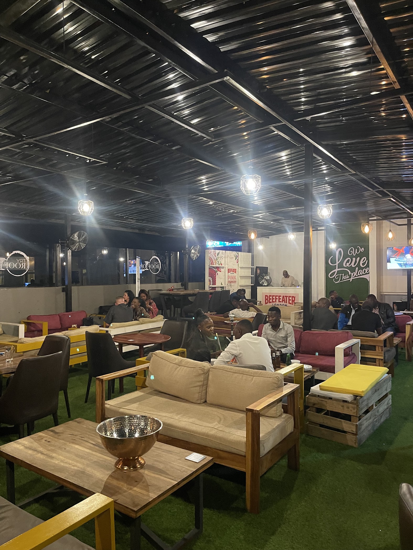 The exterior and building setting for Try Lounge Pub and Grill in Lusaka, useful for recognizing the stop from Great East Road.